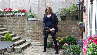 Alison wanking in her new nylon mac and thigh boots