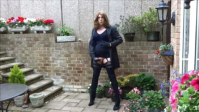 Alison wanking in her new nylon mac and thigh boots