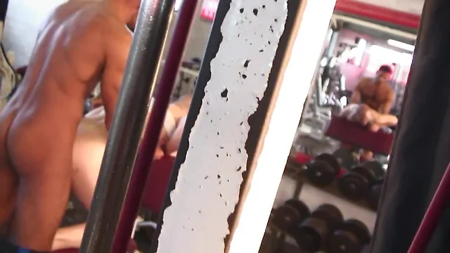 Tanned stud nails hot guy's ass in the gym