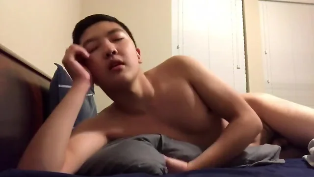 Horny Asian in Bed