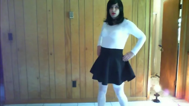 cute in black skirt and white outfit posing and riding dildo