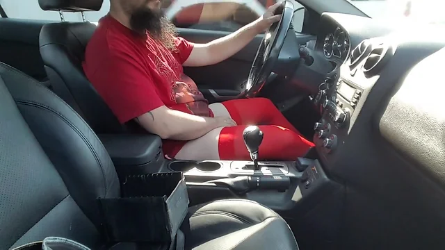 Driving and Stroking in Red Stockings