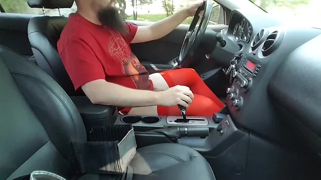 Driving and Stroking in Red Stockings