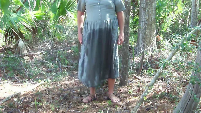 Pee on Green dress in maritime forest 1 - Video 161.mp4