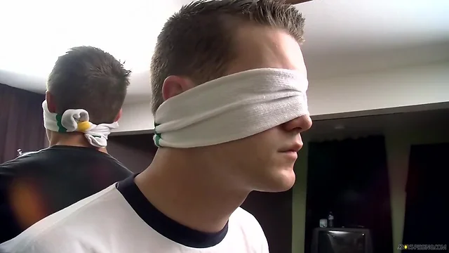 Cocksucker Bryce Corbin blindfolded and pissed on sex fest