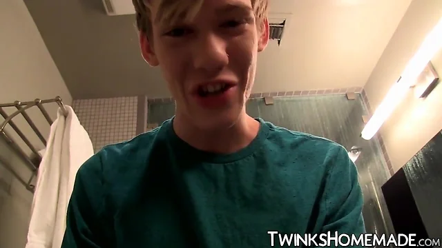 Thin teenager plays with his penis in the bathroom solo