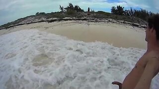 HARD NUDE GUY WALKING AROUND A BEACH