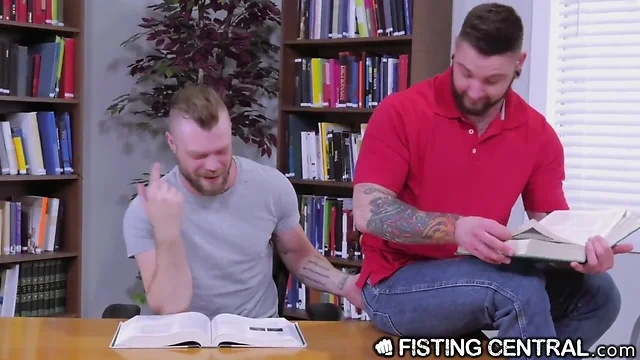 Fistingcentral tattooed sporty hunks fist instead of study