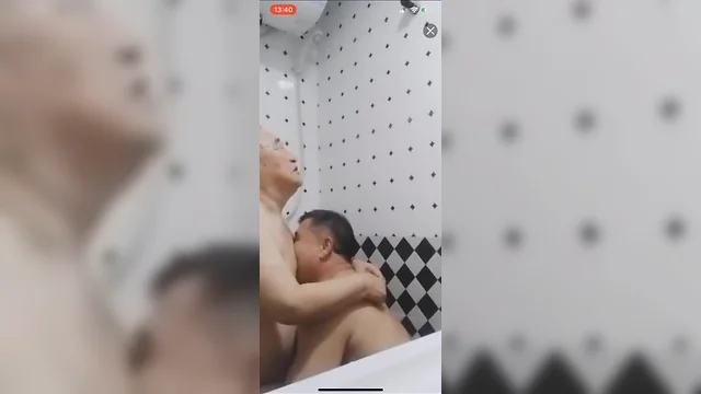 Asiatic pappy and old man taking a bath
