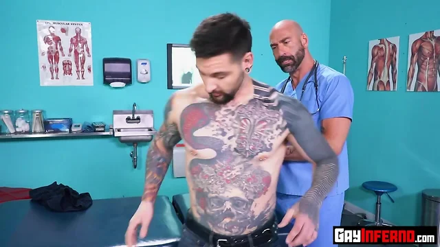 Tattooed lad fistfucked by two doctors