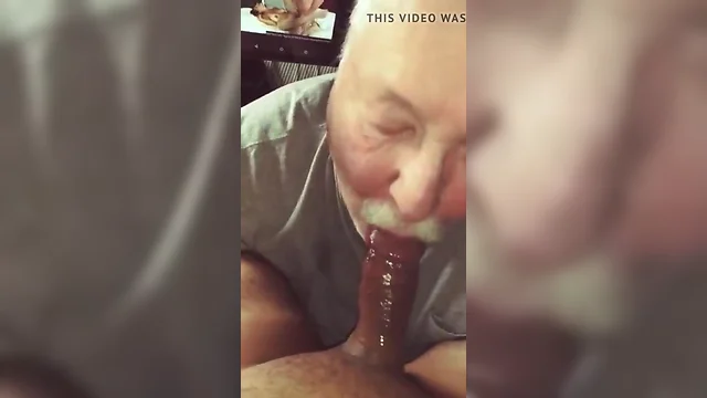 Moustach daddy sipping ebony penis
