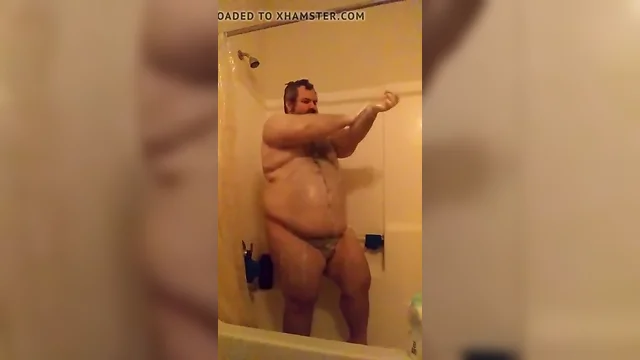 Thick man in the shower
