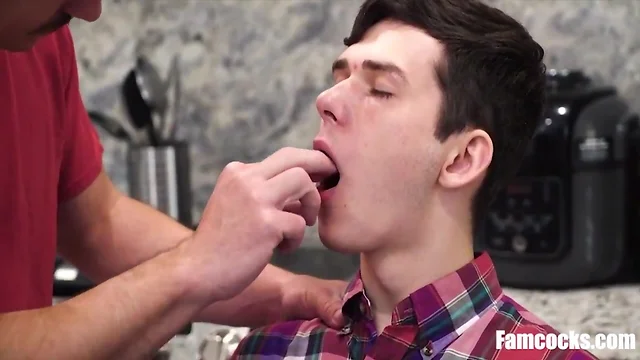 Thorough inspection of his sons mouth with his cock