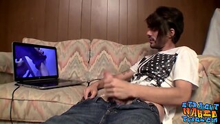 Thin straight thug jerks off while watching internet porn
