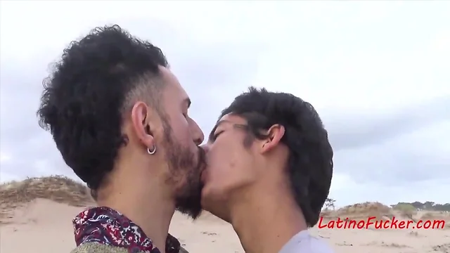 Agitated gay latin sex by the beach