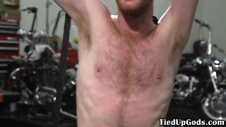 Ripped bdsm dom restrains and gags ginger sub