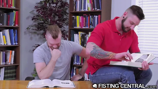 Fistingcentral tattooed muscly hunks fist instead of study