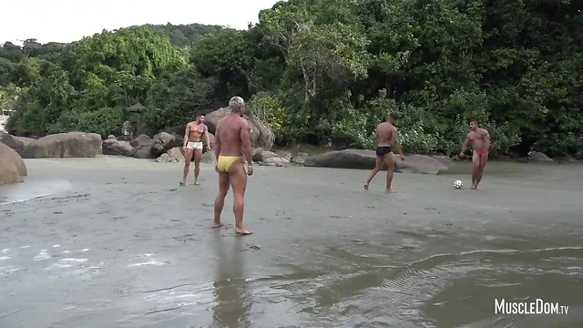 Nude football on the beach