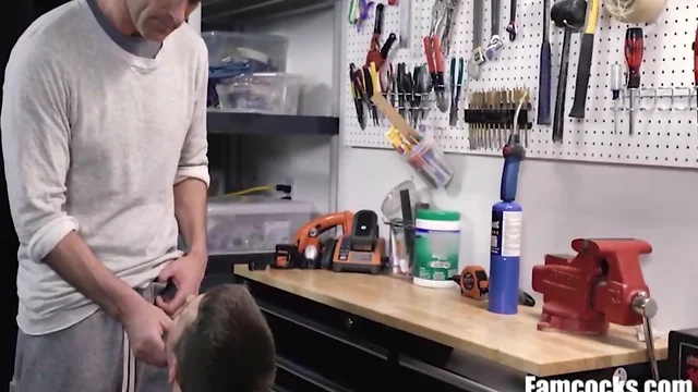 Teaching son how to use his tool