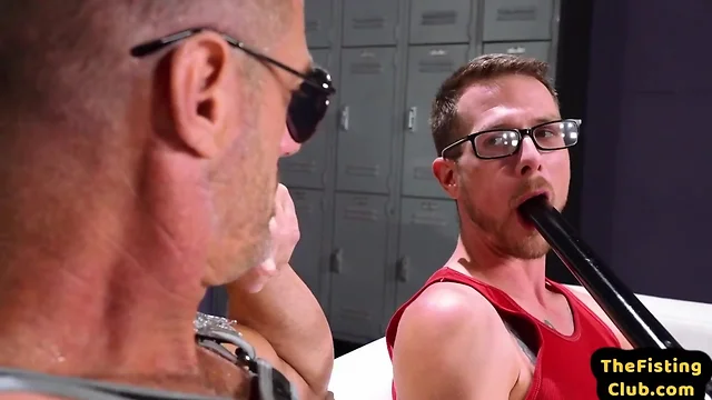 Nerdy jock getting fisted and sucked off by dominating dilf