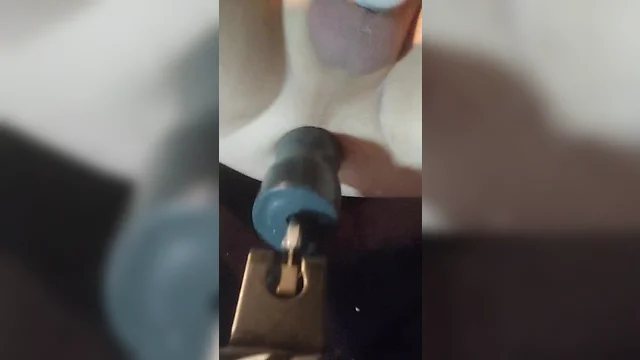 Using the fuck saw with a giant-sized dildo
