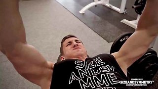 Hot bodybuilder flexing his muscles