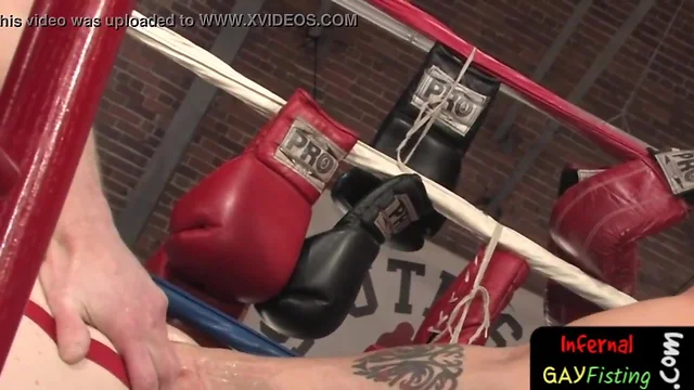 Boxer jock takes fist all in during bdsm sesh