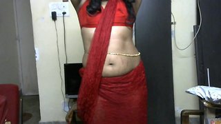 Krithi strip tease in red saree, navel tease with belly chain, curvy hip