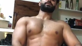Attractive stud fucking off his fat dick
