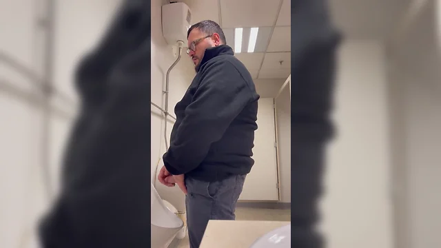 Bull caught on camera in public toilet shooting a big load