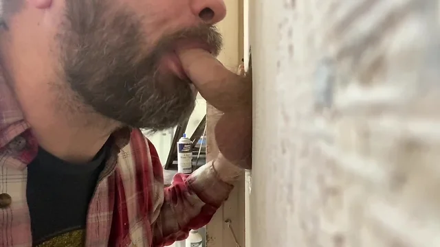 Sucking a thrilled man at a glory hole - full video