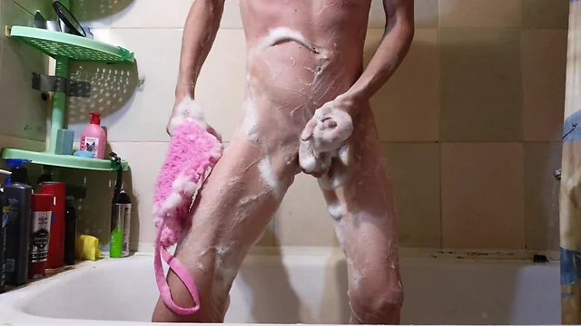Sissy bathing in foam reveals ass and genitals