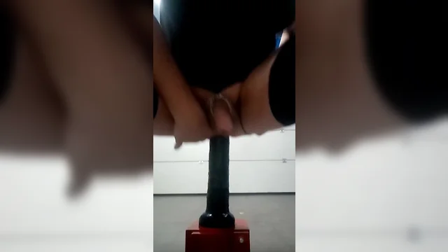 Inserting a black dildo into my hole