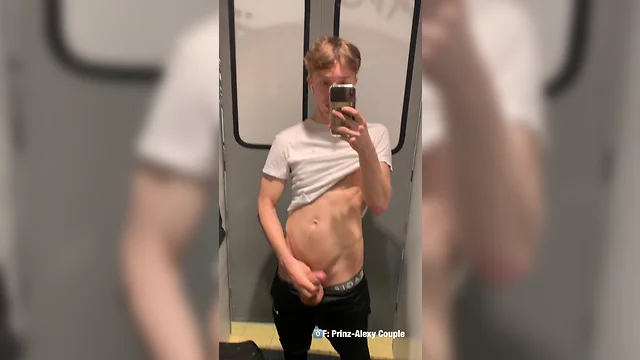 Twink masturbates in fitting room and ejaculates on mirror