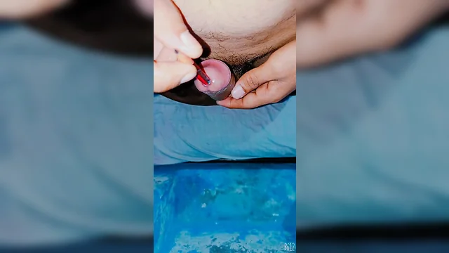 Insert pencil into penis using vaseline