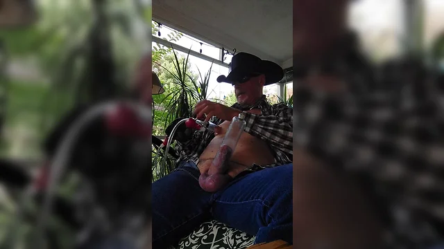Cowboy dad milks rooster and relaxes on back porch