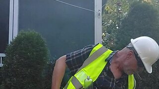 Construction dad exhausted after long, hot day of work