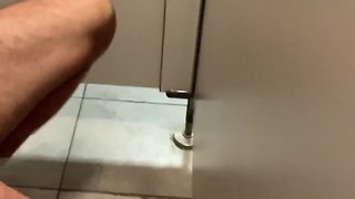 Public toilet stall twink jerks random guys big dick, makes him cum