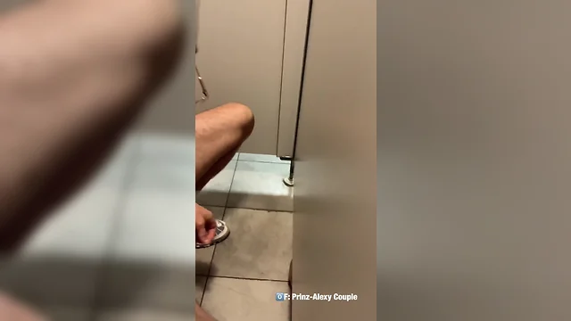 Public toilet stall twink jerks random guys big dick, makes him cum