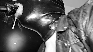 Leather and latex deepthroating slave