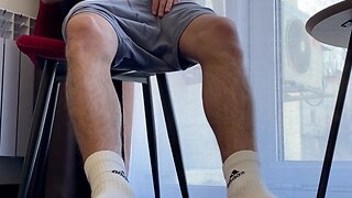 Guy jerks off dick wearing white adidas socks and hairy legs