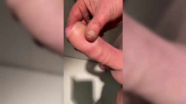 Man with uncut long foreskin ejaculates