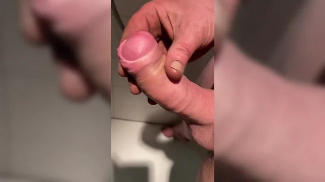 Man with uncut long foreskin ejaculates
