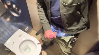 Masturbating in a public bathroom at a train station wearing american eagle boxers