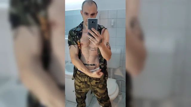 Amateur military hunk showing off in shirt and pants