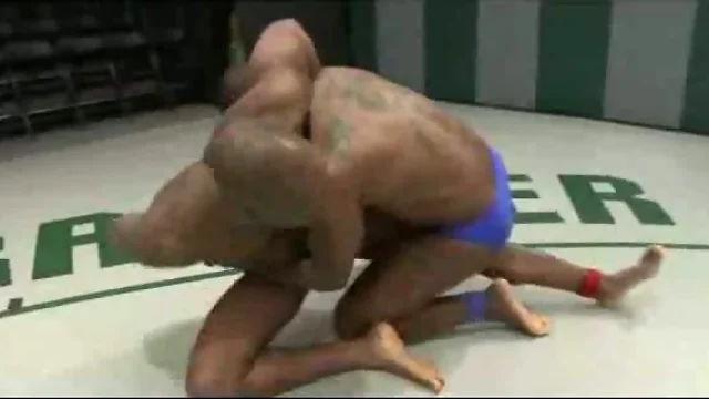 Muscular black gay guys wrestle