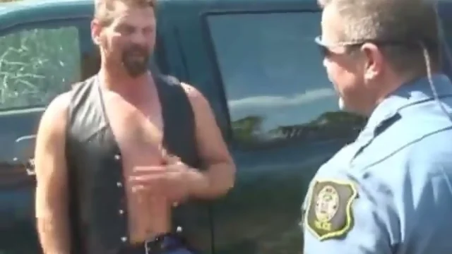 Lusty cop fucks a hot dude outdoors