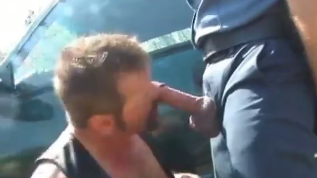 Lusty cop fucks a hot dude outdoors