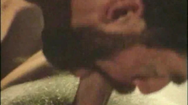 Bearded bottom in retro gay video